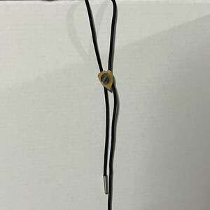 Vintage Handcrafted Gold Tone Shield and Silver Tone Cowboy Hat Bolo Tie